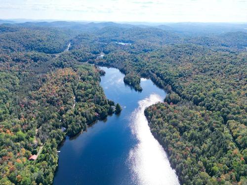 Aerial photo - 399 Ch. Du Lac-Chevreuil, Amherst, QC - Outdoor With Body Of Water With View