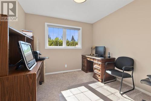 Fourth bedroom in upper level which is currently being used as an office - 209, 27475 Township Road 380, Rural Red Deer County, AB 