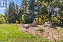 Septic tank access hidden under faux rocks - 