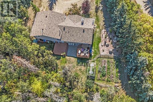 Aerial view of the back yard with the large garden area - 209, 27475 Township Road 380, Rural Red Deer County, AB 