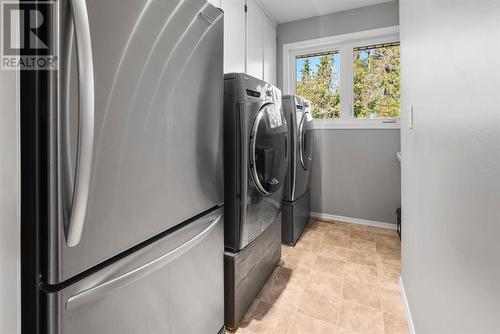 Laundry room on the main level - 209, 27475 Township Road 380, Rural Red Deer County, AB 