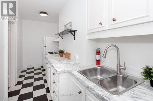 12 Russell Street E, Kawartha Lakes (Lindsay), ON - Indoor Photo Showing Kitchen With Double Sink