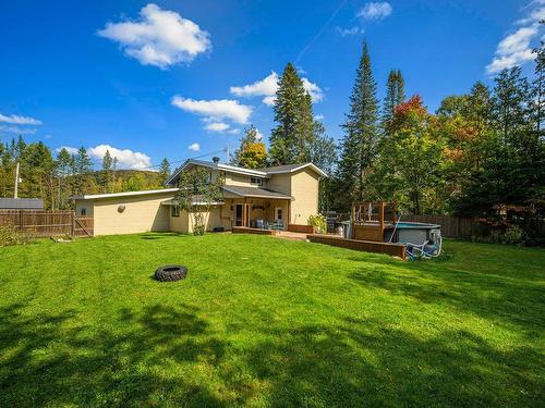 Cour - 109 Rue Du Sommet-Vert, Sainte-Marguerite-Du-Lac-Masson, QC - Outdoor With Backyard