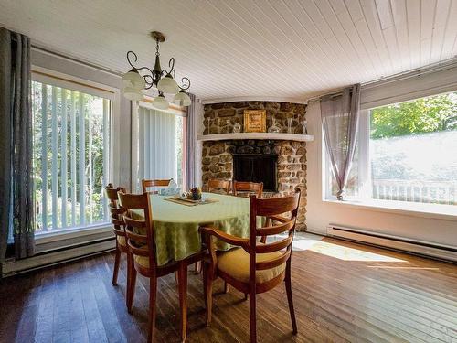 Dining room - 295 Rue Latour, Mont-Tremblant, QC - Indoor Photo Showing Dining Room With Fireplace