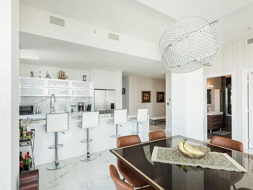 Dining room - 809-4001 Rue Elsa-Triolet, Laval (Chomedey), QC - Indoor Photo Showing Kitchen