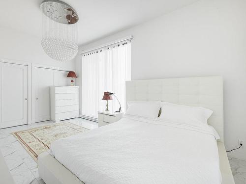 Master bedroom - 809-4001 Rue Elsa-Triolet, Laval (Chomedey), QC - Indoor Photo Showing Laundry Room