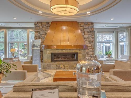 Other - 425-100 Ch. De Kandahar, Mont-Tremblant, QC - Indoor Photo Showing Living Room With Fireplace