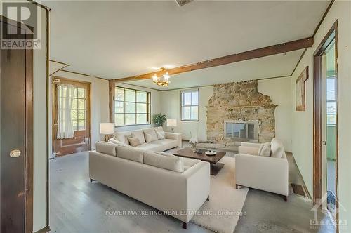 2720 Wylie Road, North Glengarry, ON - Indoor Photo Showing Living Room With Fireplace