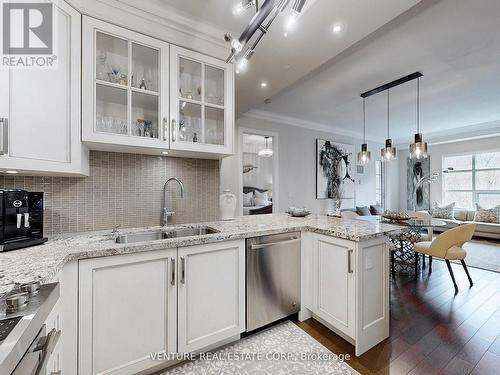 205 - 9909 Pine Valley Drive, Vaughan (Vellore Village), ON - Indoor Photo Showing Kitchen With Double Sink With Upgraded Kitchen