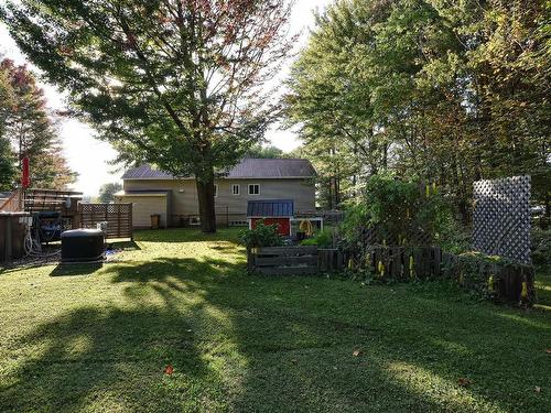 Back facade - 191 Rue Jean, Notre-Dame-De-Lourdes, QC - Outdoor With Backyard