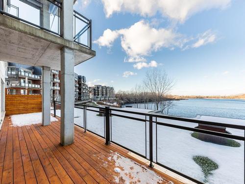 Patio - 1303-333  - A Boul. Clairevue E., Saint-Bruno-De-Montarville, QC - Outdoor With Body Of Water With View With Exterior