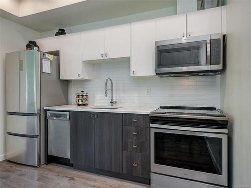 312-767 Tyee Rd, Victoria, BC - Indoor Photo Showing Kitchen With Stainless Steel Kitchen With Upgraded Kitchen