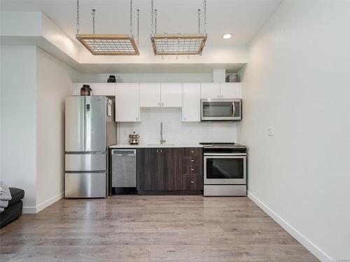 312-767 Tyee Rd, Victoria, BC - Indoor Photo Showing Kitchen With Stainless Steel Kitchen