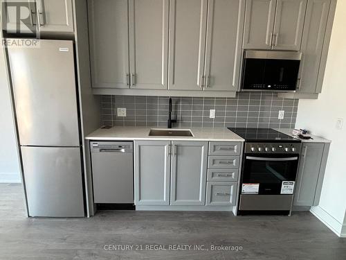 429 - 2343 Khalsa Gate, Oakville, ON - Indoor Photo Showing Kitchen With Stainless Steel Kitchen