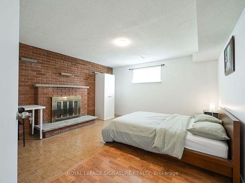 570 Louis Dr, Mississauga, ON - Indoor Photo Showing Bedroom With Fireplace