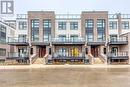 105 - 1577 Rose Way, Milton, ON  - Outdoor With Balcony With Facade 