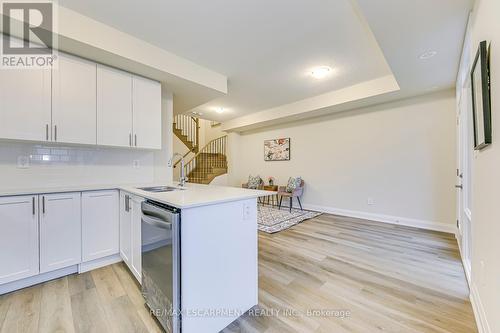 105 - 1577 Rose Way, Milton, ON - Indoor Photo Showing Kitchen