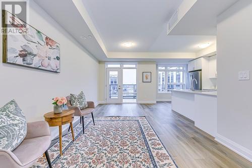 105 - 1577 Rose Way, Milton, ON - Indoor Photo Showing Living Room