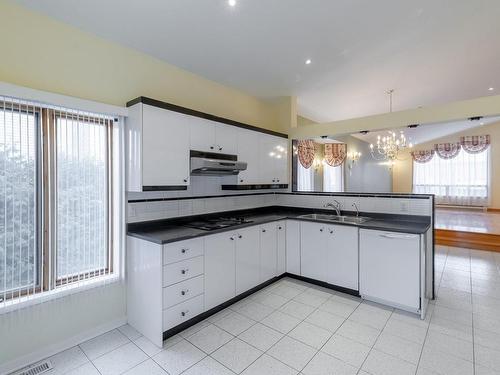 Cuisine - 8974 Crois. Richmond, Brossard, QC - Indoor Photo Showing Kitchen With Double Sink