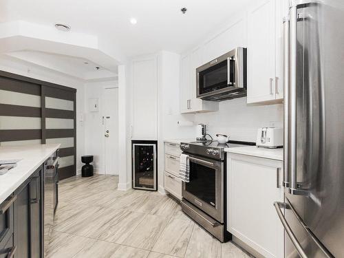 Kitchen - 208-4877 Av. Wilson, Montréal (Côte-Des-Neiges/Notre-Dame-De-Grâce), QC - Indoor Photo Showing Kitchen With Upgraded Kitchen