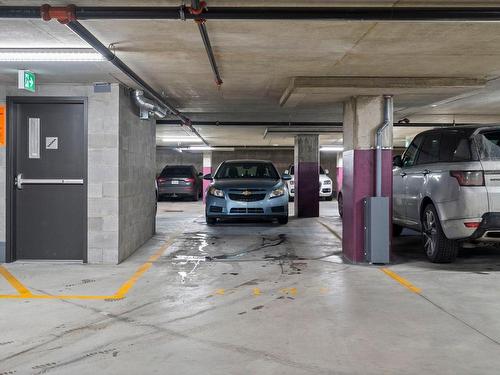 Parking - 105-5505 Boul. Du Quartier, Brossard, QC - Indoor Photo Showing Garage