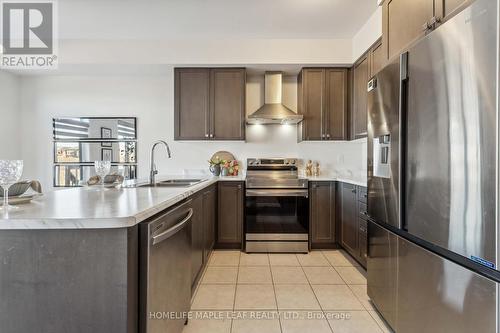 8273 Tulip Tree Drive, Niagara Falls, ON - Indoor Photo Showing Kitchen With Double Sink