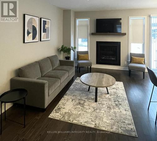 626 Rathburn Lane, Ottawa, ON - Indoor Photo Showing Living Room With Fireplace