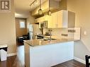 107 110 Baxter Avenue, Kitimat, BC  - Indoor Photo Showing Kitchen With Double Sink 