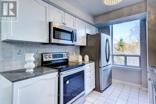 307 - 1730 Eglinton Avenue E, Toronto, ON - Indoor Photo Showing Kitchen