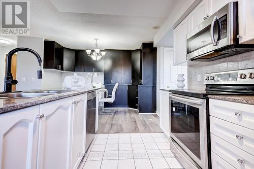 307 - 1730 Eglinton Avenue E, Toronto, ON - Indoor Photo Showing Kitchen