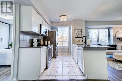 307 - 1730 Eglinton Avenue E, Toronto, ON - Indoor Photo Showing Kitchen