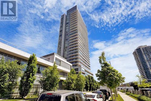 506 - 30 Herons Hill Way, Toronto, ON - Outdoor With Facade