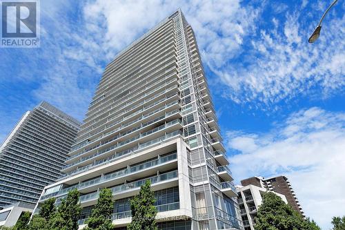 506 - 30 Herons Hill Way, Toronto, ON - Outdoor With Facade