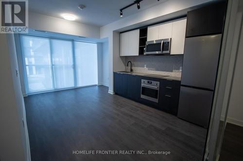 211 - 36 Zorra Street, Toronto, ON - Indoor Photo Showing Kitchen