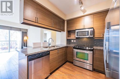 169 - 23 Cox Boulevard, Markham, ON - Indoor Photo Showing Kitchen With Stainless Steel Kitchen With Double Sink