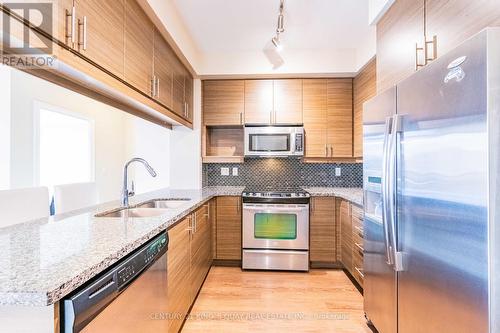 169 - 23 Cox Boulevard, Markham, ON - Indoor Photo Showing Kitchen With Stainless Steel Kitchen With Double Sink With Upgraded Kitchen