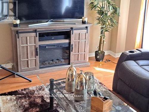 40 - 1850 Kingston Road, Pickering, ON - Indoor Photo Showing Living Room With Fireplace