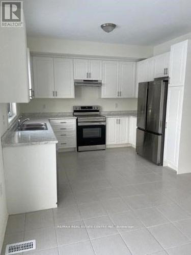 1452 Marina Drive, Fort Erie, ON - Indoor Photo Showing Kitchen With Double Sink