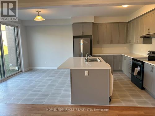 857 Knights Lane, Woodstock, ON - Indoor Photo Showing Kitchen With Double Sink