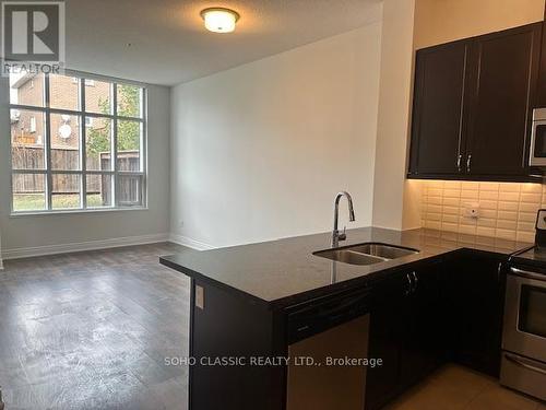 105 - 2396 Major Mackenzie Drive, Vaughan, ON - Indoor Photo Showing Kitchen With Double Sink