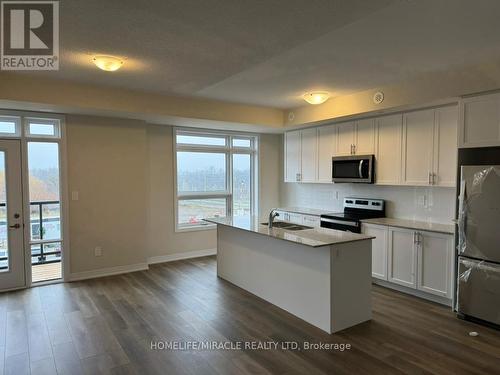 416 - 1577 Rose Way, Milton, ON - Indoor Photo Showing Kitchen With Stainless Steel Kitchen With Double Sink