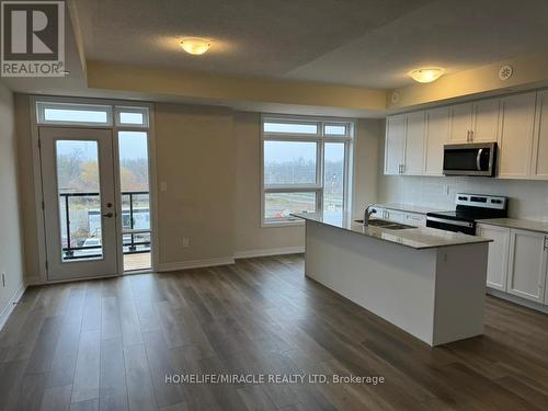 416 - 1577 Rose Way, Milton, ON - Indoor Photo Showing Kitchen