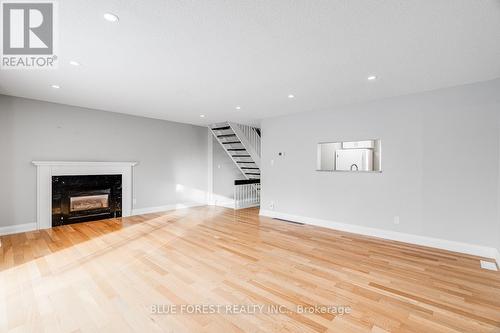 32 Winding Woods Crescent, London, ON - Indoor Photo Showing Living Room With Fireplace