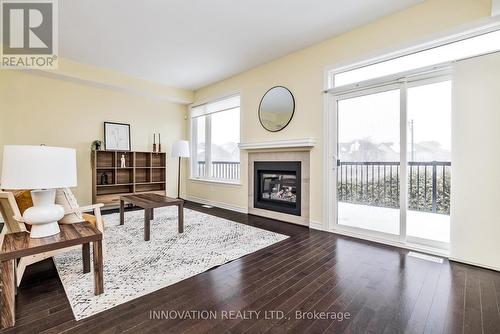 926 Fletcher Circle, Ottawa, ON - Indoor Photo Showing Living Room With Fireplace