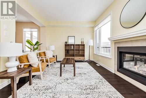 926 Fletcher Circle, Ottawa, ON - Indoor Photo Showing Living Room With Fireplace