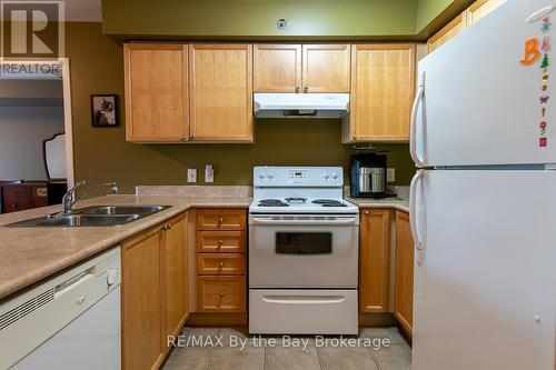 211 - 16 Westbury Road, Wasaga Beach, ON - Indoor Photo Showing Kitchen With Double Sink