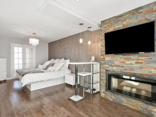 Master bedroom - 245 Rue Ludger-Duvernay, Varennes, QC - Indoor Photo Showing Bedroom With Fireplace