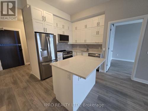 480 Gordon Krantz Avenue, Milton, ON - Indoor Photo Showing Kitchen With Stainless Steel Kitchen With Upgraded Kitchen