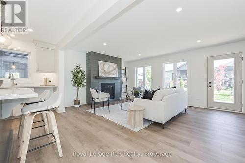 518 Newfoundland Street, Wellington North (Mount Forest), ON - Indoor Photo Showing Living Room With Fireplace