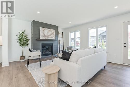 518 Newfoundland Street, Wellington North (Mount Forest), ON - Indoor Photo Showing Living Room With Fireplace